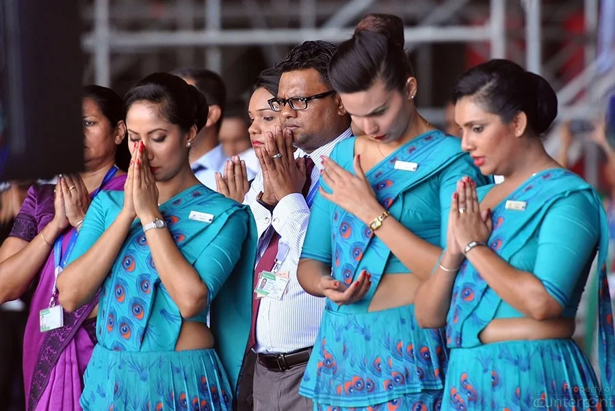 SriLankan crew members participating in the religious ceremony, conducted to bless the aircraft