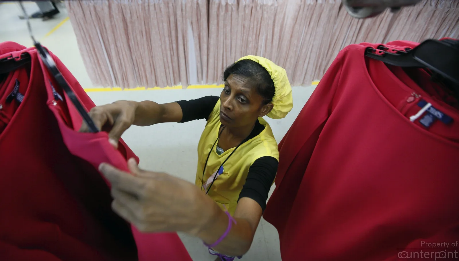 Garments being prepared for the export market. Another major foreign exchange earner, these factories are staffed mostly by women.