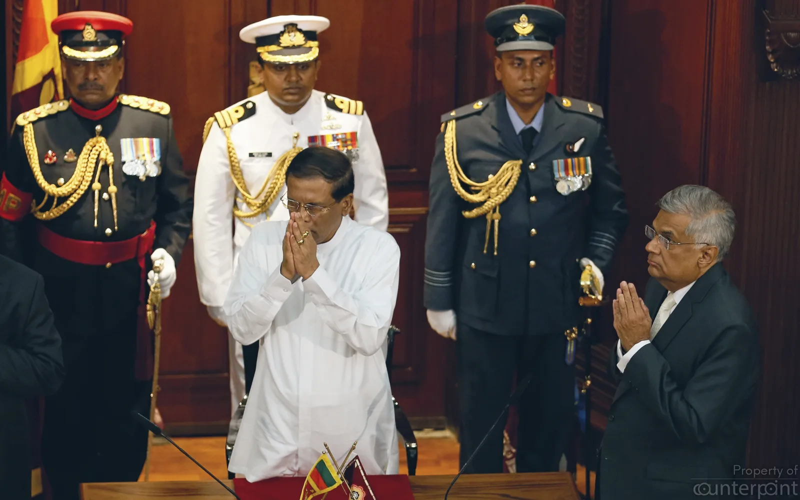 Ranil Wickremesinghe, Leader of the United National Party with Sri Lanka's President Maithripala Sirisena during the ceremony to swear in Wickremesinghe as Sri Lanka's new Prime Minister in 2015. 